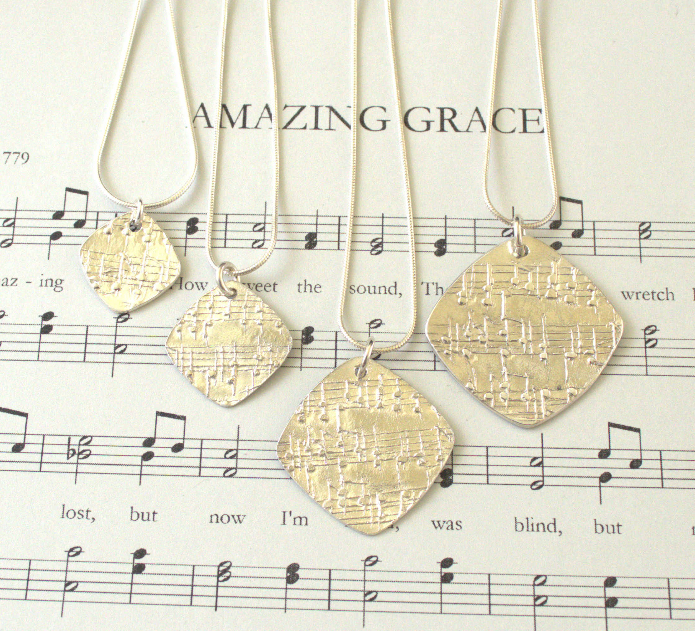 Amazing Grace Fine Silver Diamond Pendants